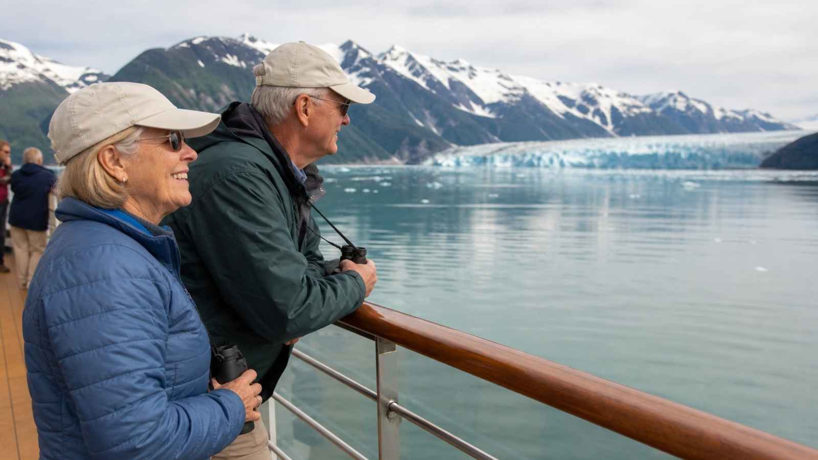 Seniors enjoying glacier views during the best month to cruise alaska